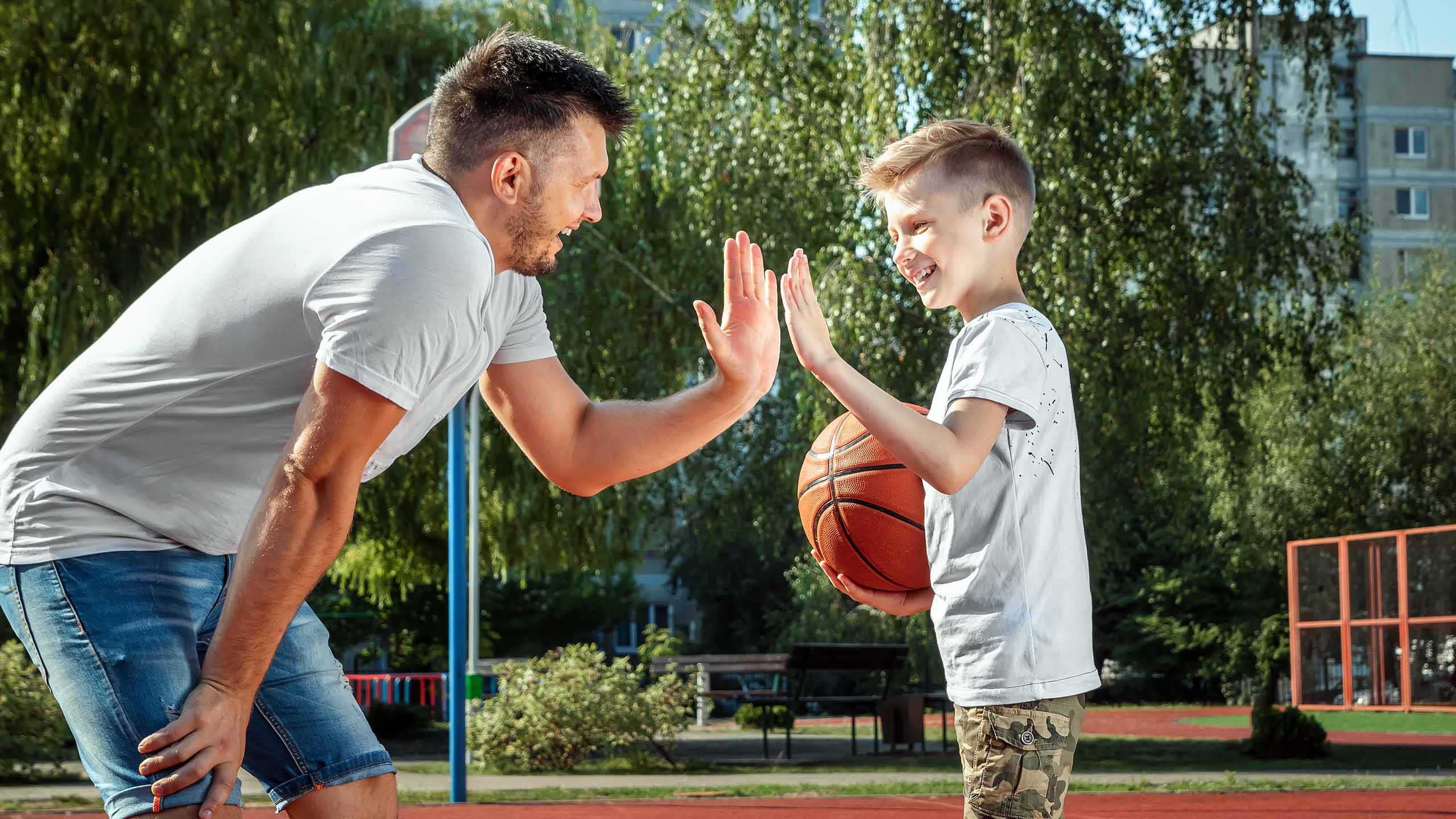 Father and Son Playing Basketball